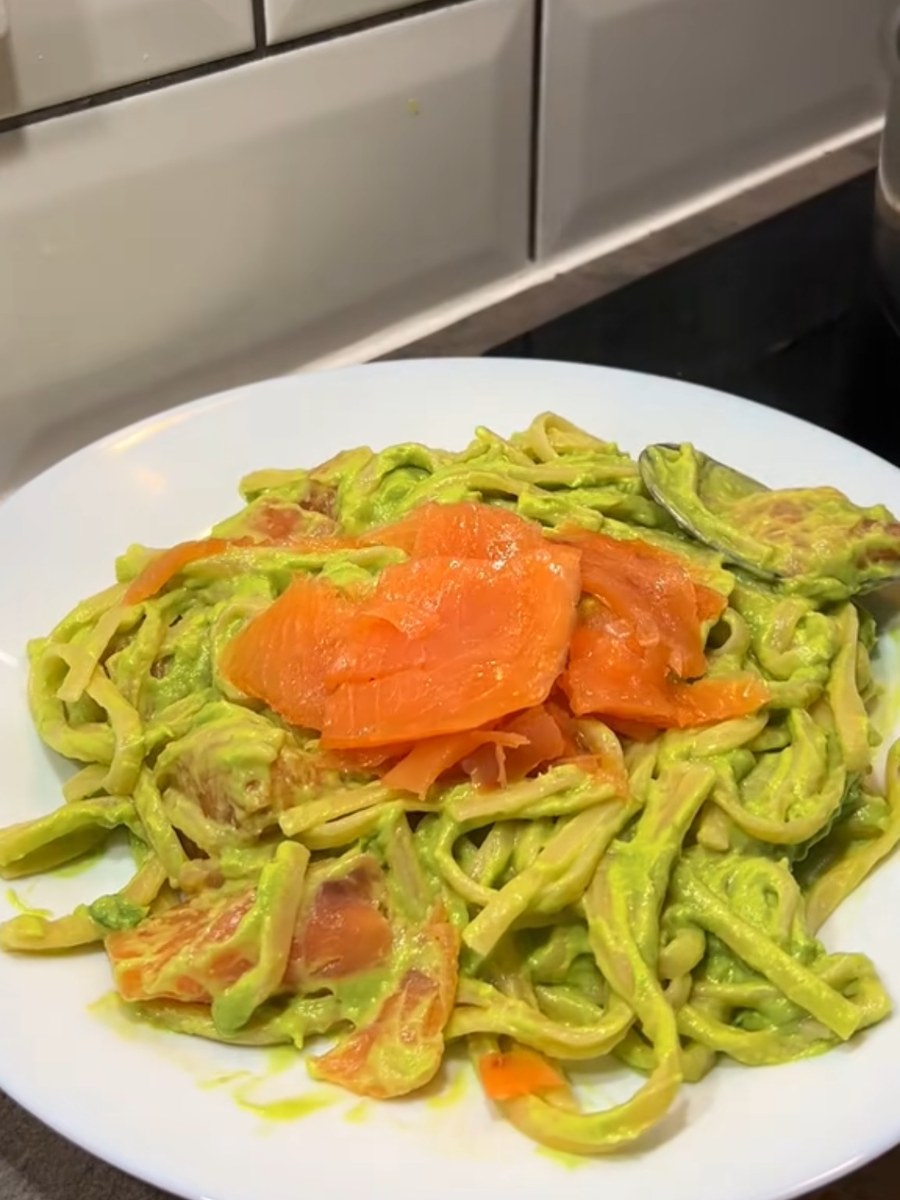 Linguine coated in a bright green avocado sauce, topped with ribbons of smoked salmon